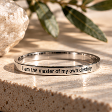 Load image into Gallery viewer, Silver affirmation ring engraved 'I am the master of my own destiny' close up - Let's Jam, Camden Town London
