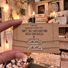Load image into Gallery viewer, Mountain charm chain bracelets shown on their printed gift card - Let's Jam jewellery, Camden Market
