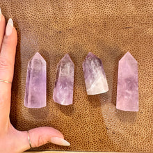 Load image into Gallery viewer, Close view of a deep purple amethyst tower and its natural markings - Let's Jam, Camden Town London
