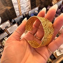 Load image into Gallery viewer, Side view of the wide gold cuff showing its pattern - Let's Jam, Camden Market London

