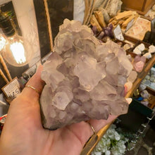 Load image into Gallery viewer, Close up of the deep purple points inside the raw Brazilian amethyst - Let's Jam, Camden Market London
