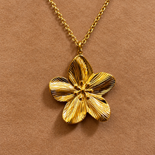 Load image into Gallery viewer, Gold cherry blossom flower pendant on a chain - Let's Jam, Camden Market, London
