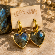 Load image into Gallery viewer, Labradorite crystal heart earrings flashing blue and green on a Let's Jam card - Let's Jam, Camden Market
