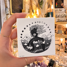 Load image into Gallery viewer, White square card with moon phases and a figure lying in the landscape - Let's Jam, Camden Town
