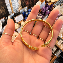 Load image into Gallery viewer, Gold double snake cuff laid open in the palm - Let's Jam jewellery, Camden Market London
