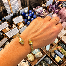 Load image into Gallery viewer, Slim gold snake cuff bangle worn with the heads on top - Let's Jam, Camden Town

