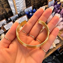 Load image into Gallery viewer, Gold multi band statement cuff laid in the palm - Let's Jam, Camden Town
