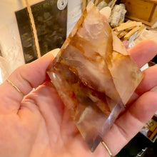 Load image into Gallery viewer, Close view of the red hematite flashes inside the fire quartz - Let's Jam, Camden Market London
