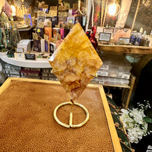 Load image into Gallery viewer, Fire quartz crystal point on its own stand with warm red hematite flashes - Let's Jam, Camden Market
