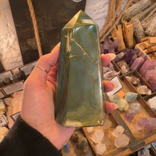 Load image into Gallery viewer, Green jasper crystal tower held in the hand to show its size - Let's Jam, Camden Market, London
