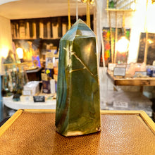 Load image into Gallery viewer, Polished green jasper crystal tower standing in the shop - Let's Jam, Camden Market
