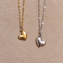 Load image into Gallery viewer, Gold and silver puffed heart pendants on chains - Let's Jam, Camden Market London
