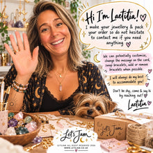 Load image into Gallery viewer, Laetitia waving at her workbench with her Yorkie, offering to change the card message and swap, add or remove bracelets - Let's Jam, Camden Market
