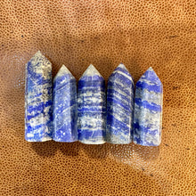 Load image into Gallery viewer, Lapis lazuli towers one to five in blue and white on a leather surface - Let's Jam, Camden Town London
