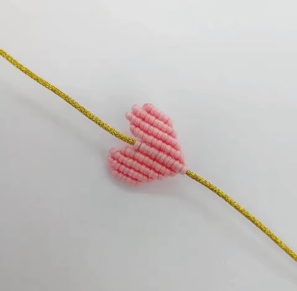 Light pink macramé heart bracelet on a gold cord - Let's Jam, Camden Market