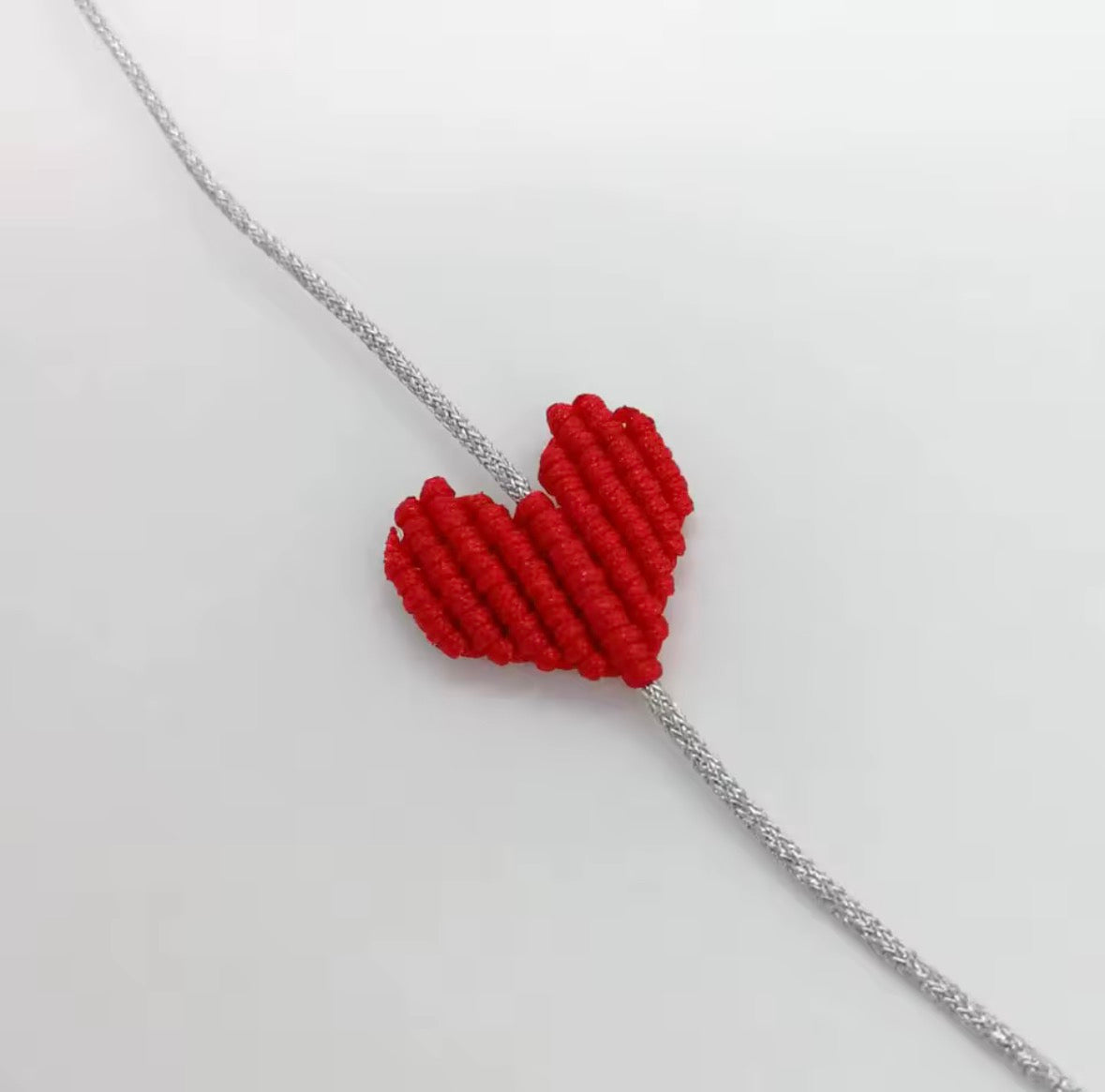 Red macramé heart bracelet on a silver cord - Let's Jam, Camden Market London