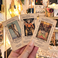 Load image into Gallery viewer, Meaning Tarot cards fanned out to show the printed keywords - Let's Jam, Camden Market, London
