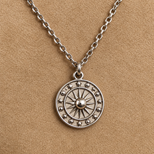 Load image into Gallery viewer, Silver sun and moon medal pendant on a chain - Let's Jam, Camden Market London

