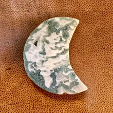 Load image into Gallery viewer, Moss agate crescent moon laid flat to show its green markings - Let's Jam, Camden Town
