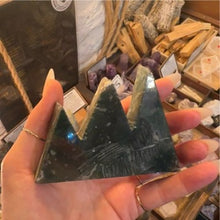 Load image into Gallery viewer, Moss agate tower held in the hand to show its size - Let's Jam, Camden Town London
