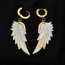 Load image into Gallery viewer, Shimmering mother of pearl wing earrings on gold hoops against black - Let's Jam, Camden Town
