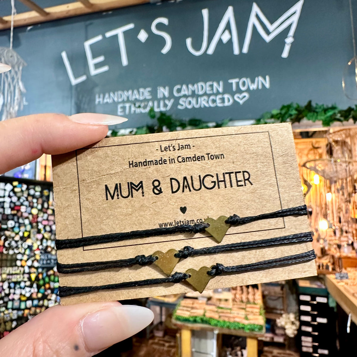 Black cord bracelet with a gold heart charm on a Let's Jam "Mum & Daughter" card - Let's Jam, Camden Town London