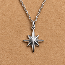 Load image into Gallery viewer, Silver eight-point northern star pendant on a chain - Let's Jam, Camden Market London
