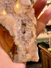 Load image into Gallery viewer, Side view of the pink amethyst slab showing its natural rock edge - Let's Jam, Camden Market London
