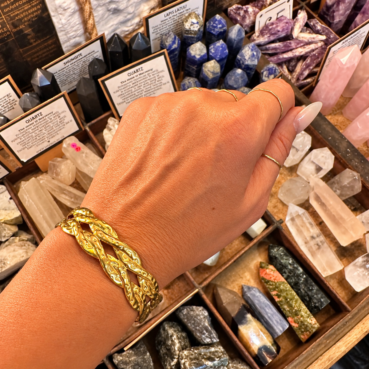 Gold twisted plait statement cuff worn on the wrist - Let's Jam, Camden Town