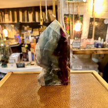 Load image into Gallery viewer, Rainbow fluorite tower showing its natural rough edge - Let's Jam, Camden Town
