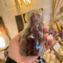 Load image into Gallery viewer, Green and purple fluorite tower held in the hand - Let's Jam, Camden Town
