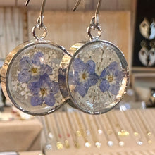 Load image into Gallery viewer, Round resin earrings with real blue pressed flowers in silver frames - Let's Jam jewellery, Camden Market
