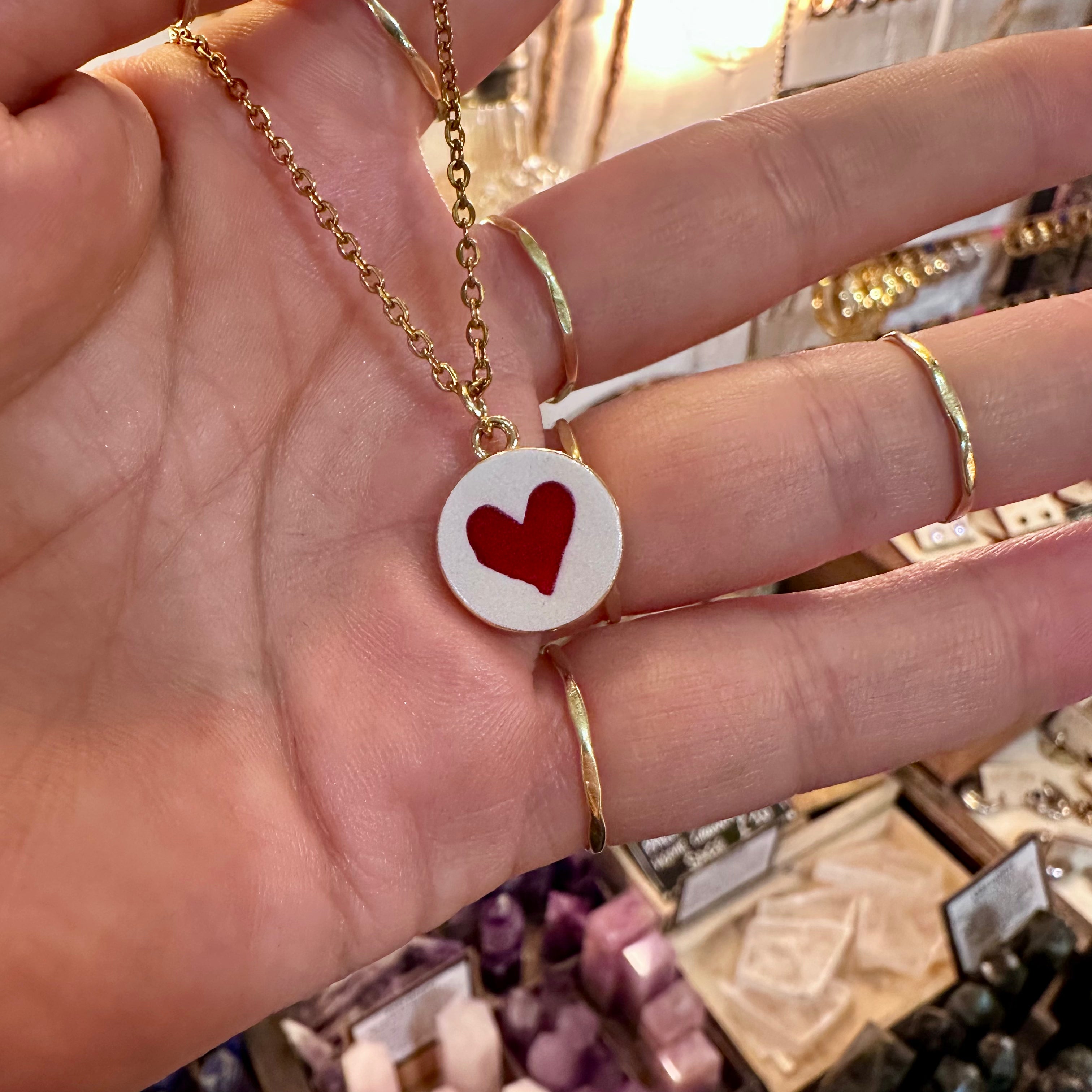 Round white ceramic pendant hand painted with a red heart in the hand - Let's Jam, Camden Town