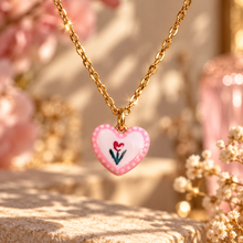 Load image into Gallery viewer, Pink ceramic heart pendant hand painted with a rose, among pink flowers - Let's Jam, Camden Market, London

