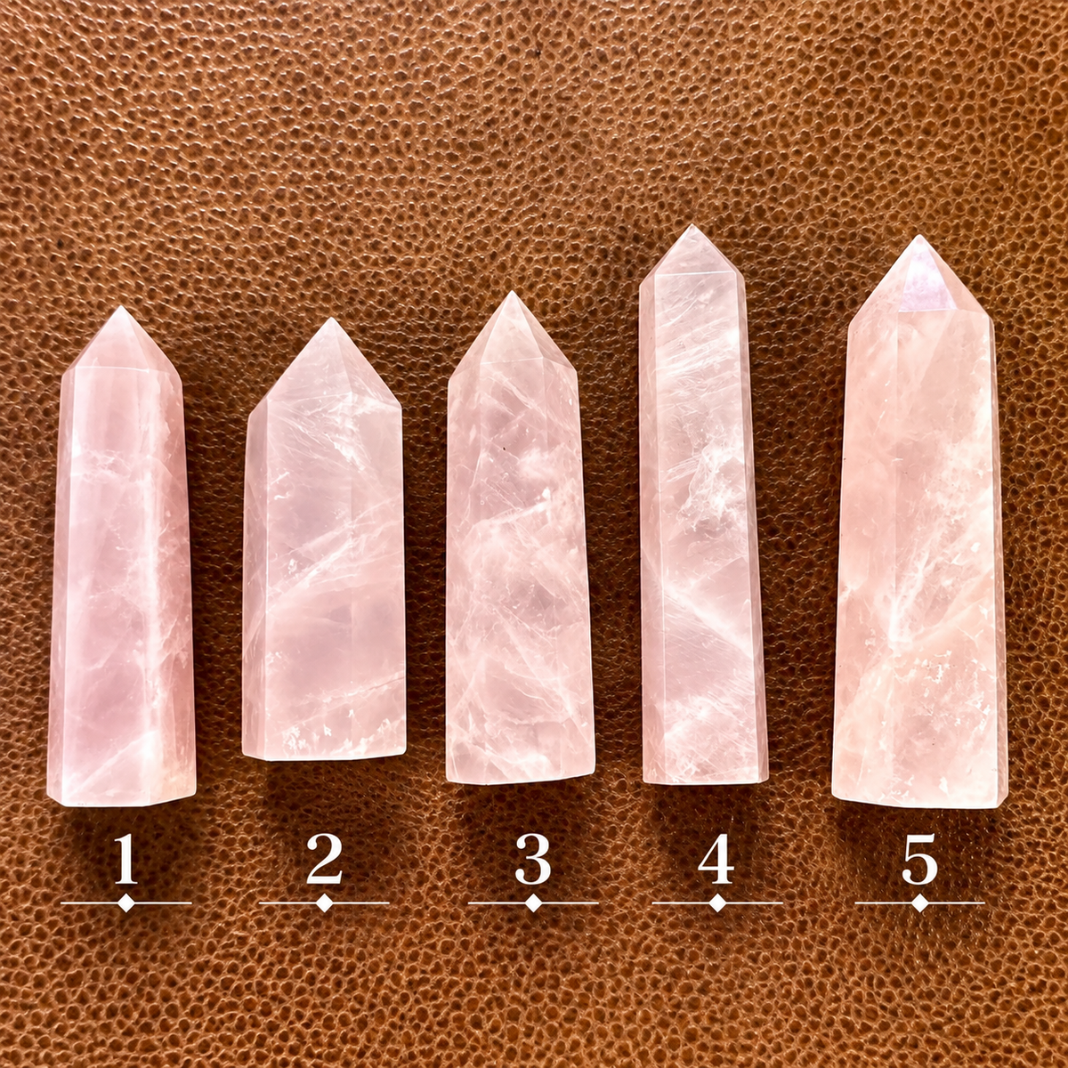 Rose quartz crystal towers numbered one to five to choose from - Let's Jam, Camden Market