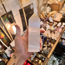 Load image into Gallery viewer, Side view of the selenite obelisk showing its four clean polished faces - Let's Jam, Camden Town
