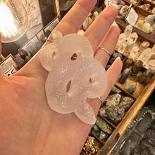 Load image into Gallery viewer, Selenite snake used as a charging plate with crystals laid along it - Let's Jam, Camden Town London
