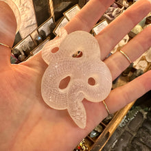 Load image into Gallery viewer, Close detail of the carved head of the selenite snake - Let's Jam, Camden Market London
