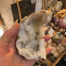 Load image into Gallery viewer, Close view of the sparkling crystal pocket inside the geode - Let's Jam, Camden Town
