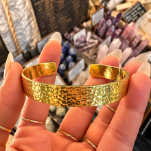 Load image into Gallery viewer, Textured gold cuff bangle held in the hand - Let's Jam, Camden Market London
