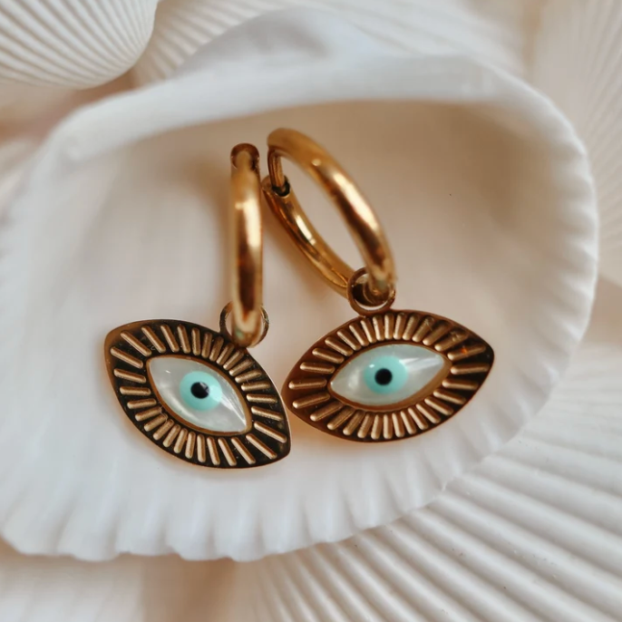 Gold third eye hoop earrings with a pearly white eye charm in a white shell - Let's Jam, Camden Market, London
