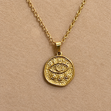 Load image into Gallery viewer, Round gold third eye medallion on a chain - Let's Jam jewellery, Camden Town London
