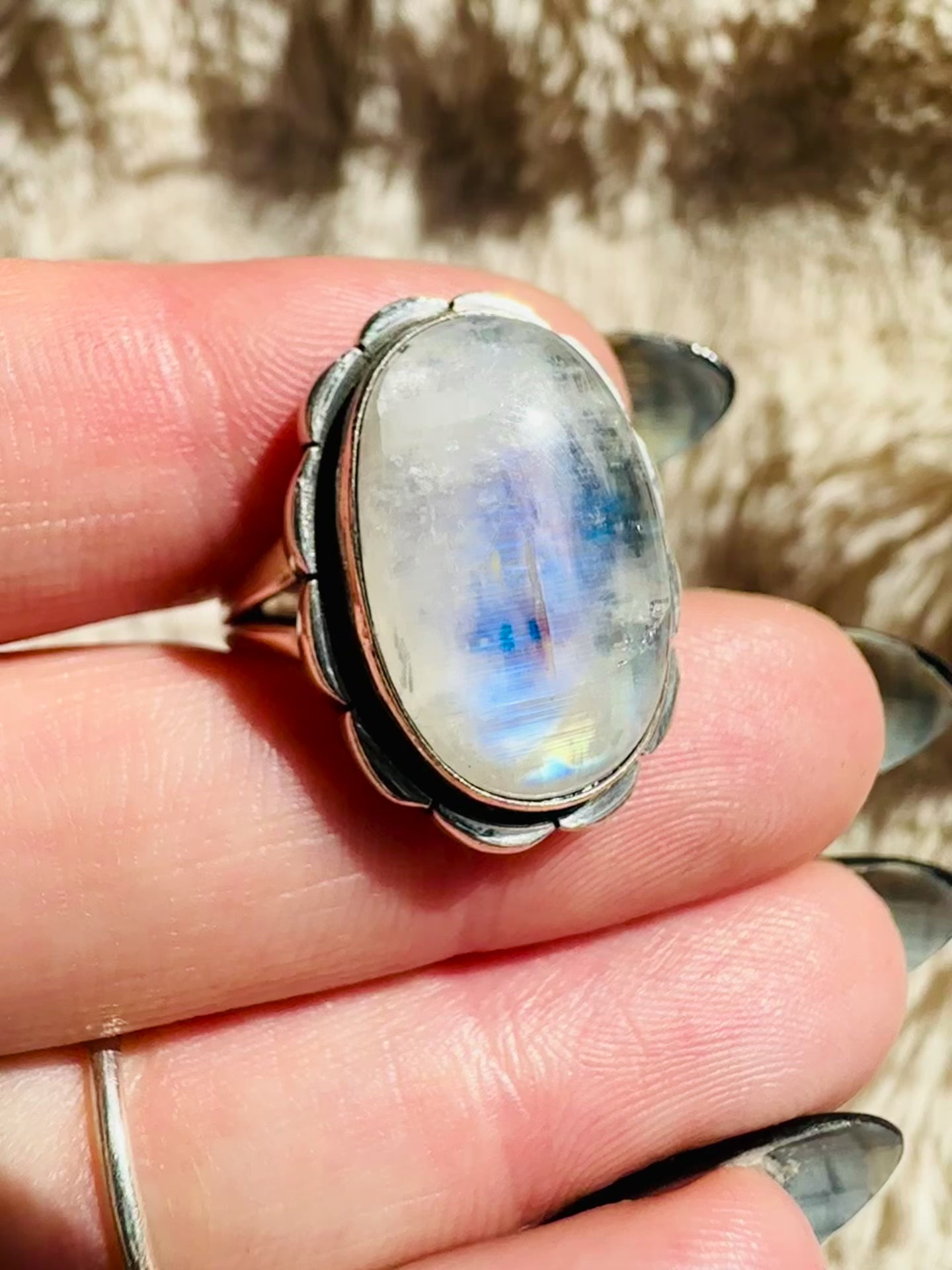Video of the moonstone sterling silver ring, oval cabochon, turning in the light - Let's Jam, Camden Town