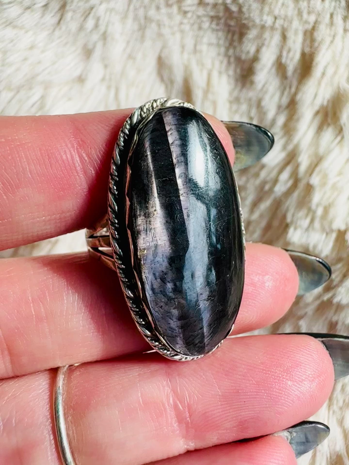Handmade 925 sterling silver ring with a long oval silver sheen black obsidian cabochon showing a chatoyant light band, rope-edge silver bezel, one-of-a-kind gemstone ring - Let's Jam jewellery collection