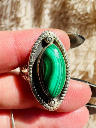 Video of the malachite sterling silver ring, marquise, scalloped trim, turning in the light - Let's Jam, Camden Town London