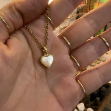 Load and play video in Gallery viewer, Video of the mother of pearl heart necklace - Let's Jam, Camden Town
