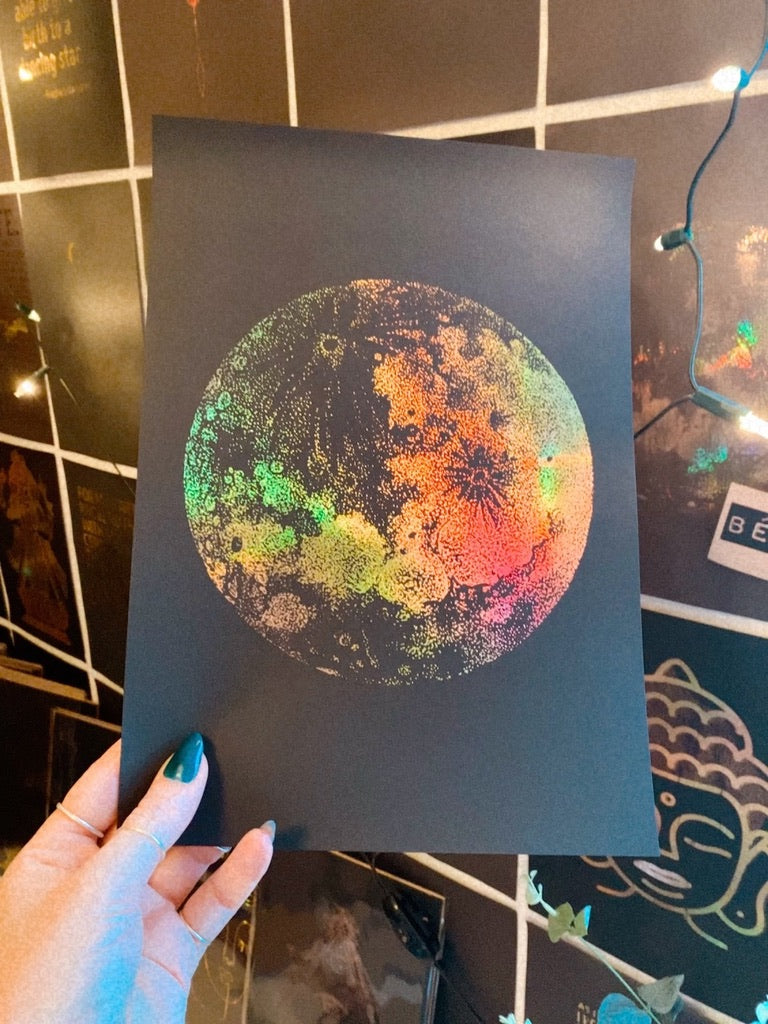 Stippled art print of the full moon in rainbow holographic foil on black - Let's Jam art prints, Camden Market