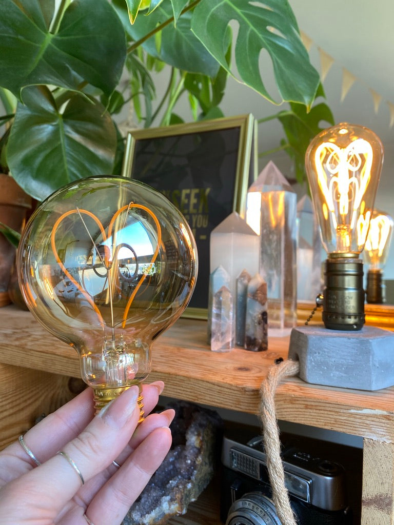 Handmade concrete lamp fitted with a glowing heart-shaped LED filament bulb - Let's Jam lamps, Camden Market