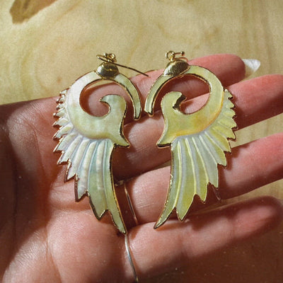 Video of the yellow mother of pearl wing earrings (clip 3 of 3) - Let's Jam, Camden Town London