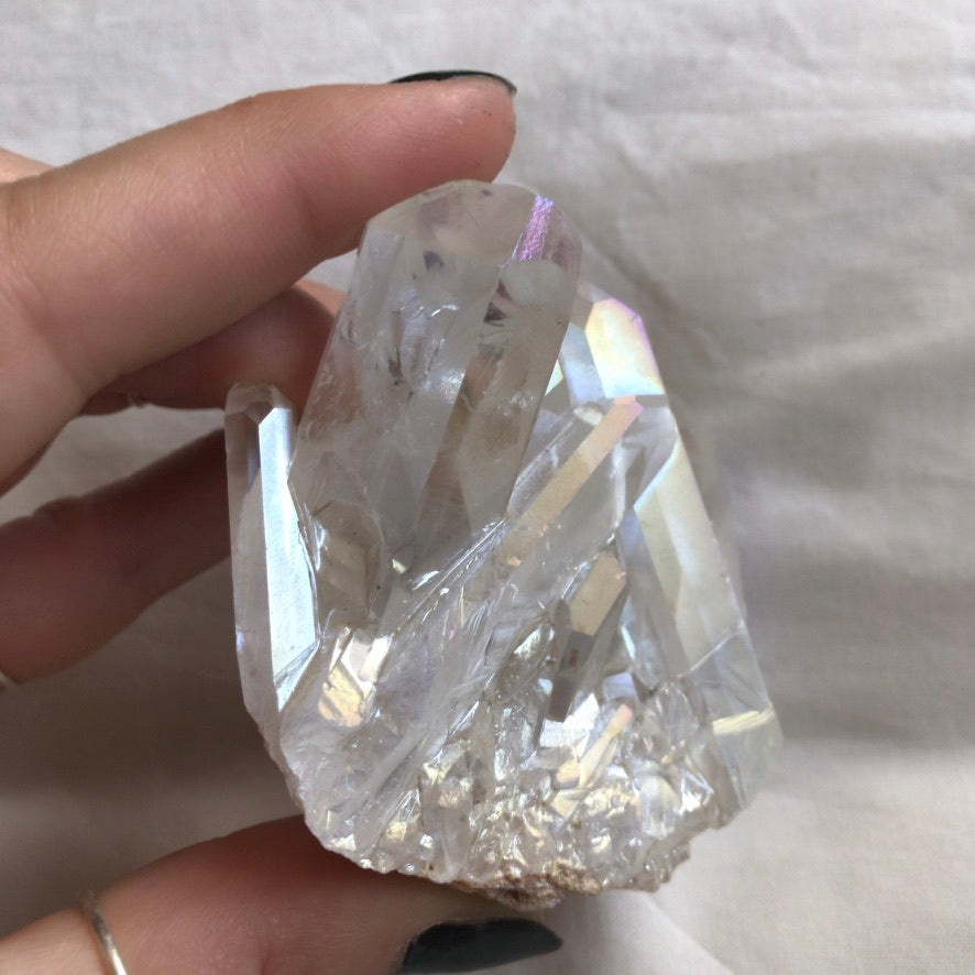 Angel aura quartz cluster seen from above, points fanning out from the base - Let's Jam crystals, Camden Market London